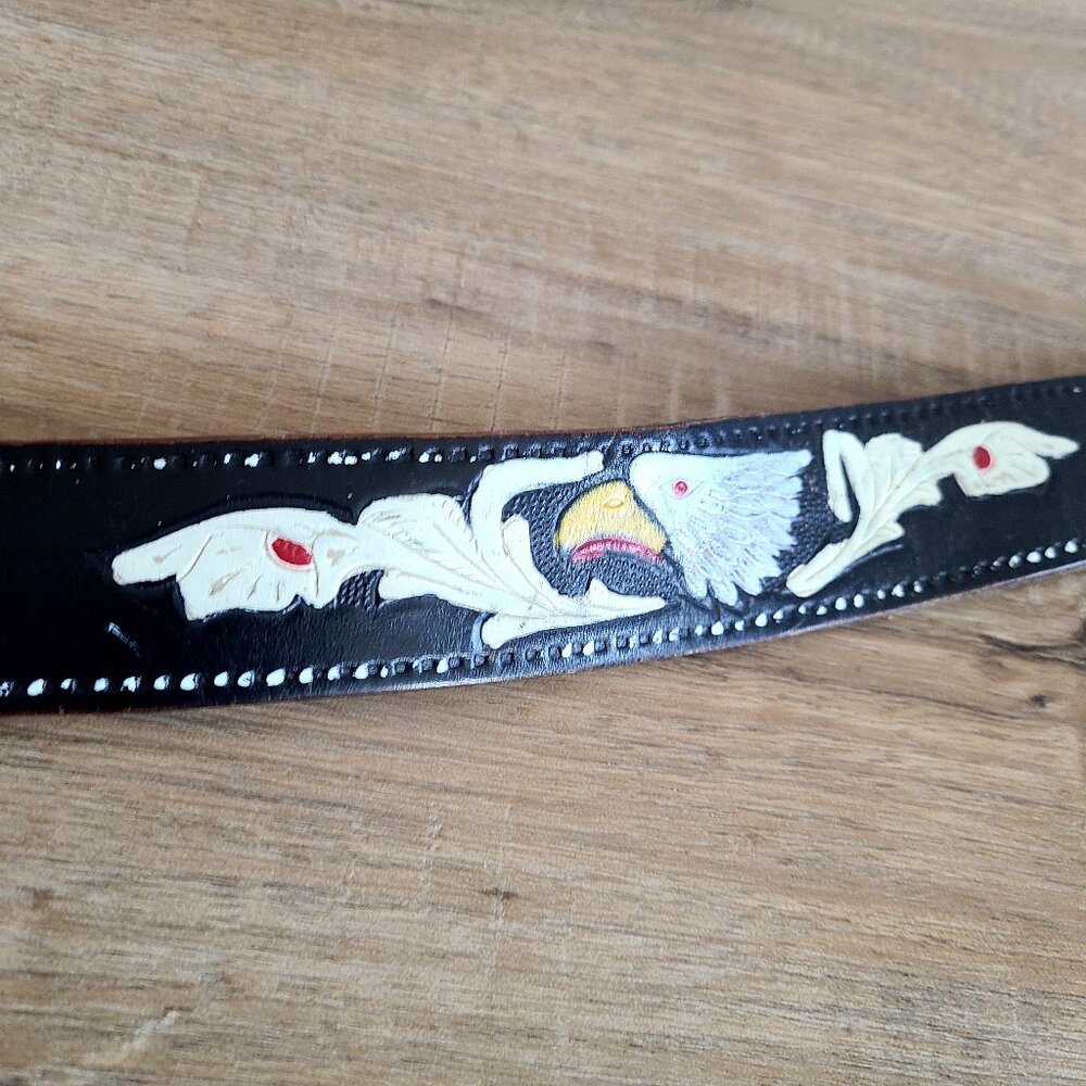 Handmade black tooled leather belt with painted eagles.
